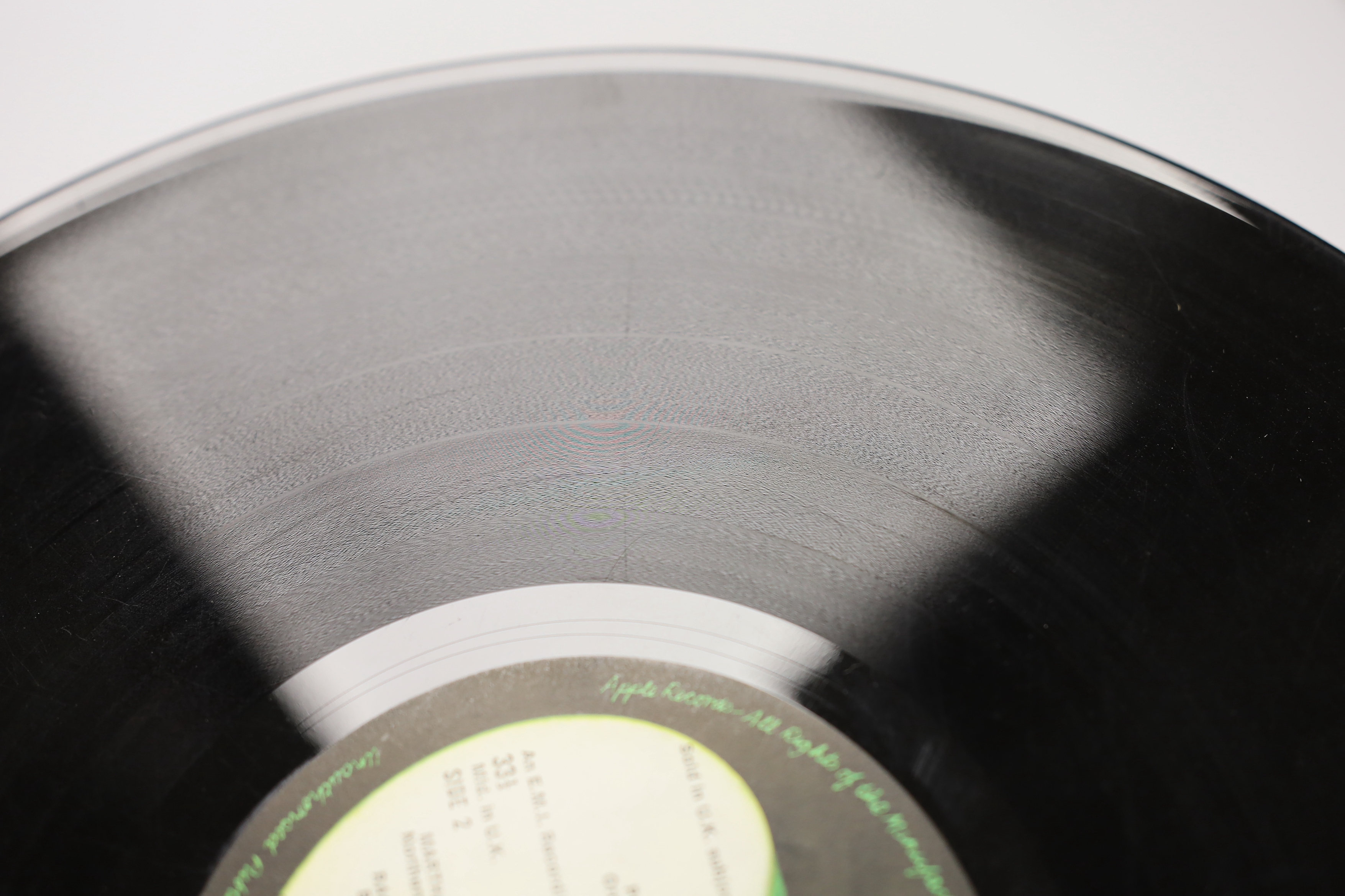 The Beatles; The White Album, top opening cover numbered 0557785, two LPs with set of four photographs and booklet, missing inner sleeves